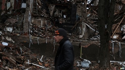 Russia-Ukraine War: A man walks down a war-torn street, as Russia's attack on Ukraine continues. (Reuters)