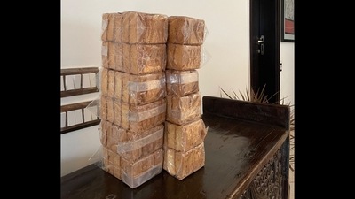 Two huge stacks of sooji rusks placed on the table. (Twitter/@parrysingh)