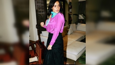 Neha Sharma paired her look with a blue satin scarf and tangerine platform shoes. (Instagram/@nehasharmaofficial) Neha Sharma paired her look with a blue satin scarf and tangerine platform shoes. (Instagram/@nehasharmaofficial)