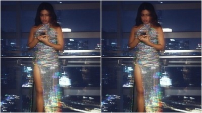 Bhumi looked absolutely ravishing in the silver gown heavily embellished in multicoloured stonework, featuring a halter neckline, with plunging neckline cut-out details, a thigh high slit and a long train. (Instagram/@bhumipednekar) Bhumi looked absolutely ravishing in the silver gown heavily embellished in multicoloured stonework, featuring a halter neckline, with plunging neckline cut-out details, a thigh high slit and a long train. (Instagram/@bhumipednekar)