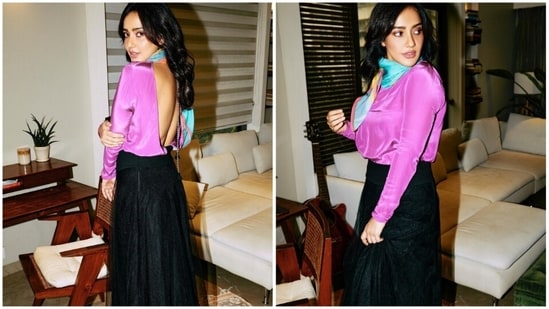 Neha Sharma's sartorial fashion choices have been one of the major reasons for the actor to make headlines. From creating her own look to being styled in gorgeous designer fits, the actor can pull off any look effortlessly. She loves experimenting with her looks and never fails to impress the fashion police with her picks. In her latest stills, she can be seen acing the vintage-inspired look in a pink satin shirt and a black fishnet skirt.&nbsp;(Instagram/@nehasharmaofficial)
