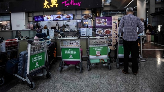 According to the previous Covid rules, those flying into the city were been banned from entering bars and restaurants for the first three days while they undergo tests. (AFP)