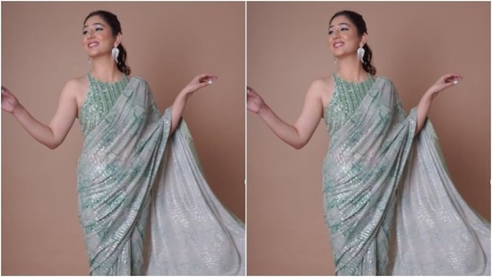 In statement silver feather earrings and a finger ring from Rubans Jewellery, Disha aced the look. Disha’s husband Rahul Vaidya had the best reaction to her pictures. He dropped by to comment with, “Hayyeeee.” (Instagram/@dishaparmar)
