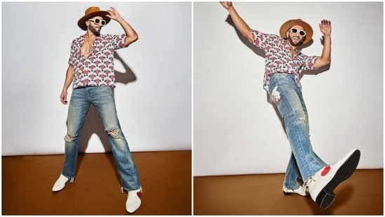 Ranveer wore an off-white shirt decorated with quirky strawberry print and featuring an unbuttoned top to reveal his chiselled torso, half-length sleeves, a figure-skimming fitting, and a collared neckline.&nbsp;(Instagram)