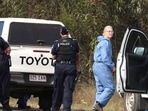 Queensland Shooting: Police work near the scene of a fatal shooting, where police shot multiple people at a remote Queensland property.
