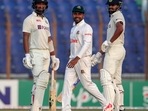 India's Cheteshwar Pujara, left, Bangladesh's Mehidy Hasan Miraz center and India's Shreyas Iyer react after a delivery (AP) India's Cheteshwar Pujara, left, Bangladesh's Mehidy Hasan Miraz center and India's Shreyas Iyer react after a delivery (AP)