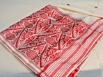 A day of pride for Assam, as Gamosa gets a Geographical Indication Tag. (pinterest) A day of pride for Assam, as Gamosa gets a Geographical Indication Tag. (pinterest)