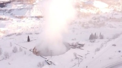 Russia: The huge collapse came at an iron-ore mine with one house seen perched on the edge. Russia: The huge collapse came at an iron-ore mine with one house seen perched on the edge.