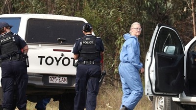 Queensland Shooting: Police work near the scene of a fatal shooting, where police shot multiple people at a remote Queensland property. (Reuters)