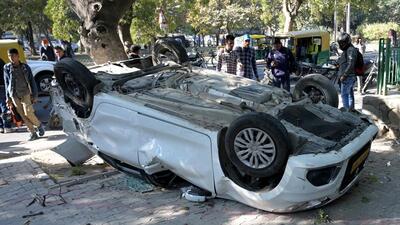 After the car overturned, its driver, Simranjit Singh, 22, a resident of Delhi, was killed on the spot as his head got crushed behind the wheel. (Ravi Kumar/HT) After the car overturned, its driver, Simranjit Singh, 22, a resident of Delhi, was killed on the spot as his head got crushed behind the wheel. (Ravi Kumar/HT)
