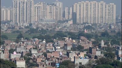 An unauthorised colony at the Hindon River floodplain in Noida on Monday. (Sunil Ghosh/HT Photo)