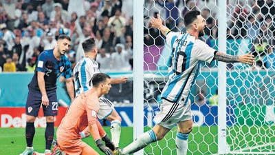 Argentina's forward #10 Lionel Messi celebrates after Argentina's forward #09 Julian Alvarez scored his team's third goal during the Qatar 2022 World Cup football semi-final match between Argentina and Croatia at Lusail Stadium in Lusail, north of Doha on December 13, 2022. (AFP) Argentina's forward #10 Lionel Messi celebrates after Argentina's forward #09 Julian Alvarez scored his team's third goal during the Qatar 2022 World Cup football semi-final match between Argentina and Croatia at Lusail Stadium in Lusail, north of Doha on December 13, 2022. (AFP)