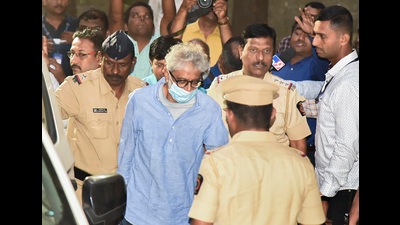 Bhima-Koregaon violence case accused Gautam Navlakha being taken to the Communist Party of India (Marxist) CPI(M) office building at Belapur in Navi Mumbai in November where he continues to be under house arrest (PTI File) Bhima-Koregaon violence case accused Gautam Navlakha being taken to the Communist Party of India (Marxist) CPI(M) office building at Belapur in Navi Mumbai in November where he continues to be under house arrest (PTI File)