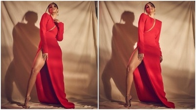Malaika styled the gown with gold and black strappy high heels, large statement hoop earrings, and rings. In the end, Malaika chose a messy bun, subtle smoky eye shadow, sleek eyeliner, mascara on the lashes, mauve lip shade, darkened brows, glowing skin, blushed cheeks, and sharp contouring. (Instagram) Malaika styled the gown with gold and black strappy high heels, large statement hoop earrings, and rings. In the end, Malaika chose a messy bun, subtle smoky eye shadow, sleek eyeliner, mascara on the lashes, mauve lip shade, darkened brows, glowing skin, blushed cheeks, and sharp contouring. (Instagram)
