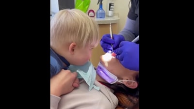 Adorable baby checking upon its mother during dental procedure. (Instagram/@Majically) Adorable baby checking upon its mother during dental procedure. (Instagram/@Majically)