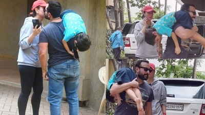 Kareena Kapoor and Saif Ali Khan share a kiss in front of paparazzi in Mumbai. (Viral Bhayani) (Viral Bhayani)