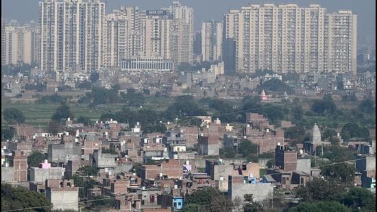 An unauthorised colony at the Hindon River floodplain in Noida on Monday. (Sunil Ghosh/HT Photo)