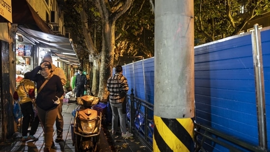 Covid Protests In China: Barricades erected along Wulumuqi Road, a site of earlier protests, in Shanghai, China.(Bloomberg)