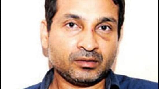 Kerala businessman Mohamed Nisham ran his Hummer into a guard to pin him against a wall for a delay in opening the gate to his luxury apartment building. (Photo courtesy- Kerala Police)