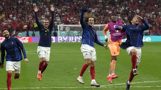 France's Antoine Griezmann celebrates with team mates after the World Cup semifinal match (AP)