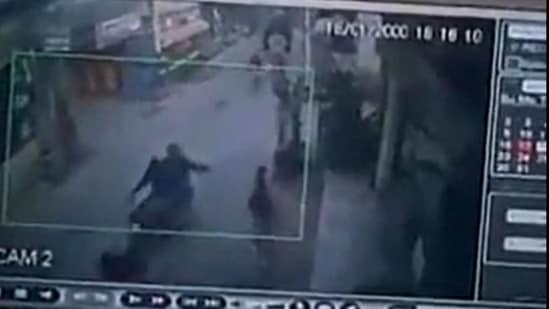 A screenshot of the CCTV footage shows two bike-borne men throwing acid on the girl. (Screengrab/Twitter video/Swati Maliwal)