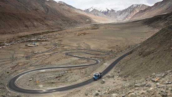 Chang La, the third-highest motorable pass in the world, is located at an elevation of 17,688 feet. Leh and the Shyok River Valley are connected by this incredibly stunning mountain pass. Apart from breathtaking views and captivating sceneries you can glimpse the stunning Pangong Tso lake, which was featured in the Bollywood film "3 Idiots," while travelling through Chang La.(Xavier Galiana / AFP)