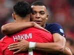 France's Kylian Mbappe hugs Morocco's Achraf Hakimi at the end of the World Cup semifinal soccer match between France and Morocco at the Al Bayt Stadium in Al Khor, Qatar, Wednesday, Dec. 14, 2022. France won 2-0 and will play Argentina in Sunday's final. 
