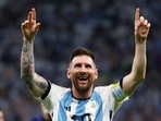 Lionel Messi celebrates for Argentina.