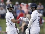 Virat Kohli batting with Cheteshwar Pujara (R)(AP) Virat Kohli batting with Cheteshwar Pujara (R)(AP)
