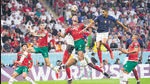 France's Raphael Varane jumps for a header during the World Cup semifinal soccer match between France and Morocco at the Al Bayt Stadium in Al Khor, Qatar, Wednesday, Dec. 14, 2022. (AP) France's Raphael Varane jumps for a header during the World Cup semifinal soccer match between France and Morocco at the Al Bayt Stadium in Al Khor, Qatar, Wednesday, Dec. 14, 2022. (AP)