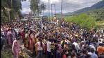People block the Rishikesh-Badrinath highway in protest against the murder, in Pauri Garhwal district. (PTI)