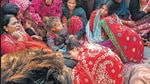 Saran: Family members and relatives of people, who died after consuming allegedly spurious liquor mourn near their mortal remains, at Ishuapur police station area in Bihar's Saran district, Wednesday, Dec. 14, 2022. (PTI Photo)(PTI12_14_2022_000243A) (PTI) Saran: Family members and relatives of people, who died after consuming allegedly spurious liquor mourn near their mortal remains, at Ishuapur police station area in Bihar's Saran district, Wednesday, Dec. 14, 2022. (PTI Photo)(PTI12_14_2022_000243A) (PTI)