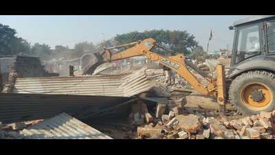 A pig farm being razed in Mohali on Thursday. (HT Photo) A pig farm being razed in Mohali on Thursday. (HT Photo)