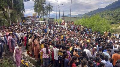 People block the Rishikesh-Badrinath highway in protest against the murder, in Pauri Garhwal district. (PTI) People block the Rishikesh-Badrinath highway in protest against the murder, in Pauri Garhwal district. (PTI)