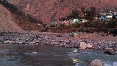 The DM said, “The presence of debris has narrowed the river and created apprehensions of flooding”. (HT Photo) The DM said, “The presence of debris has narrowed the river and created apprehensions of flooding”. (HT Photo)