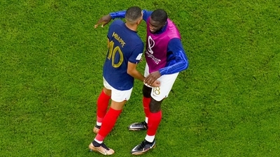 France's Dayot Upamecano, right, embraces teammate Kylian Mbappe following the World Cup semifinal soccer match between France and Morocco at the Al Bayt Stadium in Al Khor (AP) France's Dayot Upamecano, right, embraces teammate Kylian Mbappe following the World Cup semifinal soccer match between France and Morocco at the Al Bayt Stadium in Al Khor (AP)