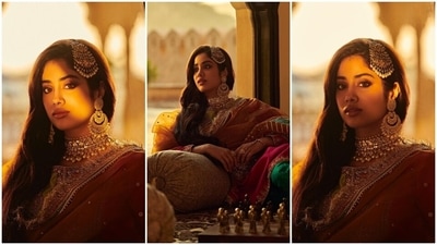 Janhvi accessorised the ensemble with a gold and pearl-adorned choker necklace, a matching passa, dangling earrings, haath phool, and rings. In the end, Janhvi chose side-parted open wavy tresses, glossy mauve lip shade, shimmery gold smoky eye shadow, mascara-adorned lashes, darkened brows, blushed cheeks, contoured face, and glowing skin. (Instagram) Janhvi accessorised the ensemble with a gold and pearl-adorned choker necklace, a matching passa, dangling earrings, haath phool, and rings. In the end, Janhvi chose side-parted open wavy tresses, glossy mauve lip shade, shimmery gold smoky eye shadow, mascara-adorned lashes, darkened brows, blushed cheeks, contoured face, and glowing skin. (Instagram)