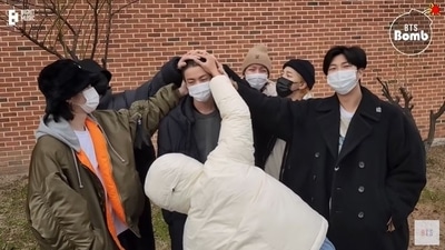 BTS members Jin, RM, Suga, J-Hope, Jimin, V, and Jungkook.
