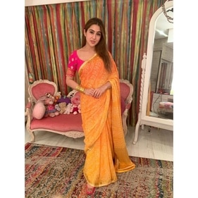 Sara Ali Khan looks like a dream in a bright orange and yellow ombre effect bandhani saree (Instagram ) Sara Ali Khan looks like a dream in a bright orange and yellow ombre effect bandhani saree (Instagram )