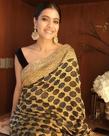 Kajol look stunning in a black and golden bandhani saree. (Instagram) Kajol look stunning in a black and golden bandhani saree. (Instagram)