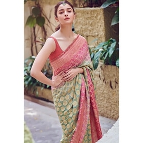 In a beautiful bandhani saree with ombre colouring in shades of red, mint green, and gold, Alia Bhatt look beautiful. (Instagram) In a beautiful bandhani saree with ombre colouring in shades of red, mint green, and gold, Alia Bhatt look beautiful. (Instagram)