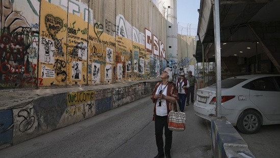 “We expect that 2023 will be booming and business will be excellent because the whole world, and Christian religious tourists especially, they all want to return to the Holy Land,” said Arja, who owns the Bethlehem Hotel to news agency AP.(AP)