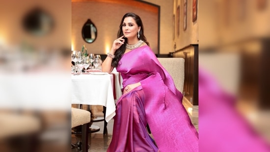 Lara Dutta looks regal in this stunning contemporary drape which is perfect for a cocktail night.(Instagram/@larabhupati)