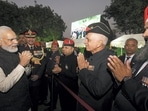 Prime Minister Narendra Modi meets army veterans during the 'At Home' reception organised on the eve of the Vijay Diwas, at Army House in Delhi on Thursday.(PTI)