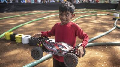 7-year-old Eric Samuel take part in the remote control car racing at the annual science and technology festival of Indian Institute of Technology, Bombay. (Satish Bate/HT PHOTO)