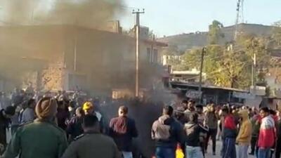 A protest broke out early on Friday in Rajouri outside the Alpha gate of an army camp after two men were shot dead (Twitter/Screengrab) A protest broke out early on Friday in Rajouri outside the Alpha gate of an army camp after two men were shot dead (Twitter/Screengrab)