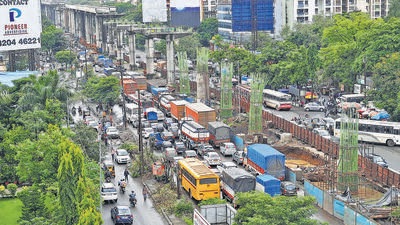 A traffic jam at Anand Nagar where MMRDA has proposed to build a flyover. (Praful Gangurde/HT Photo)