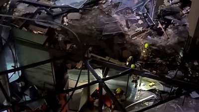 Following the burst of a huge aquarium, the atrium of a hotel is devastated in Berlin Germany. (AP) Following the burst of a huge aquarium, the atrium of a hotel is devastated in Berlin Germany. (AP)