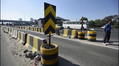 Gurugram traffic police installed tyre crash barriers on National Highway-48 at Kherki Daula toll plaza, near Sector-82 in Gurugram on Friday. (Parveen Kumar/HT Photo) Gurugram traffic police installed tyre crash barriers on National Highway-48 at Kherki Daula toll plaza, near Sector-82 in Gurugram on Friday. (Parveen Kumar/HT Photo)