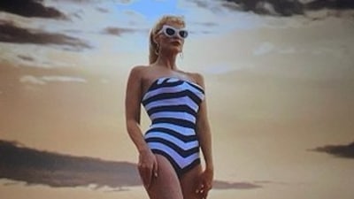 Margot Robbie as classic Barbie from the upcoming 2023 film directed by Greta Gerwig. Margot Robbie as classic Barbie from the upcoming 2023 film directed by Greta Gerwig.